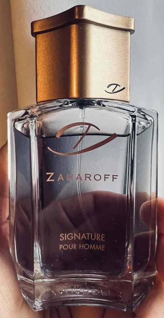 A bottle held in someone's hand