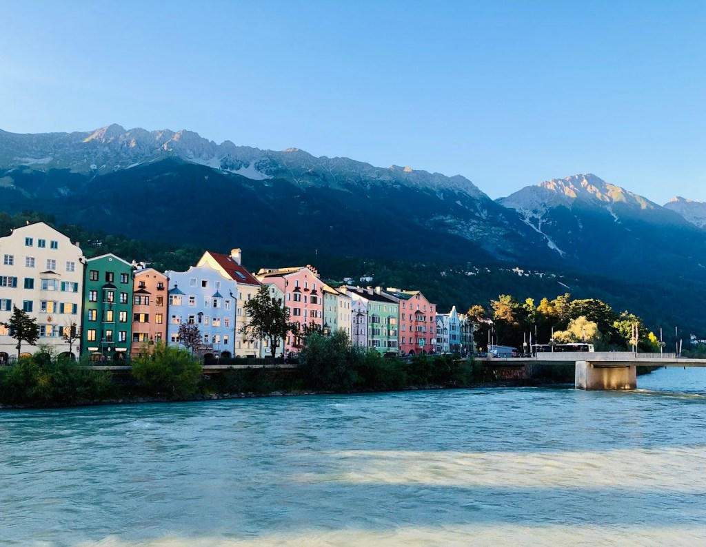 Colorful houses along a river in the mountains