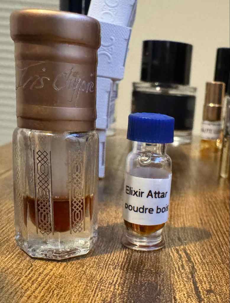 2 small vials of perfume